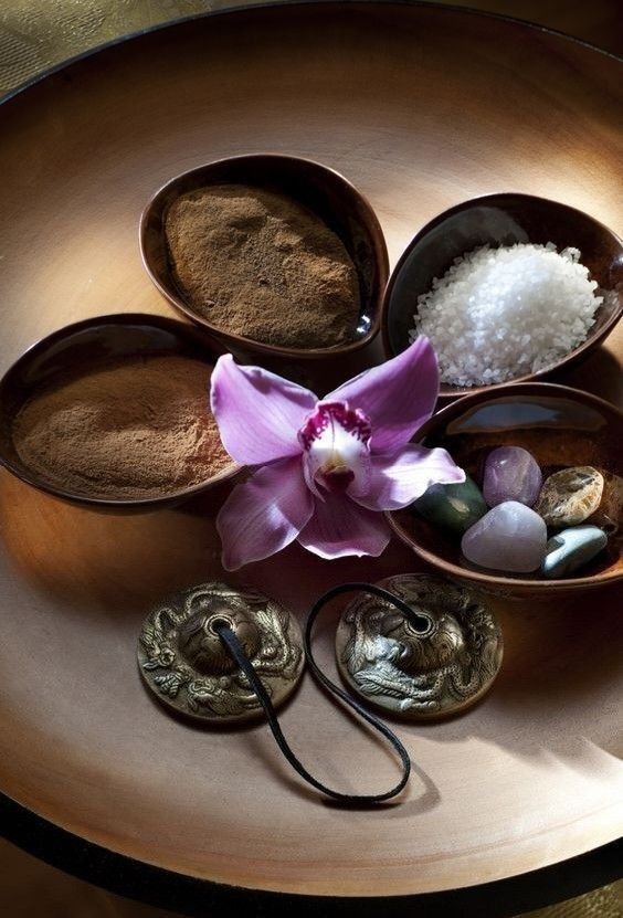 Spa setting with bowls and an orchid